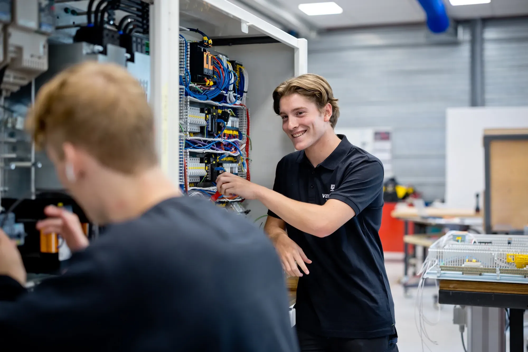 Van Gooi engineer working on an electrical distribution cabinet